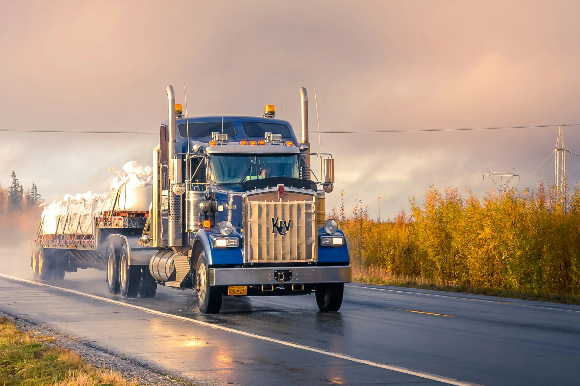 Truck moving freight on a country road